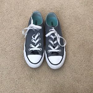 Grey & teal converse. With teal tongue.